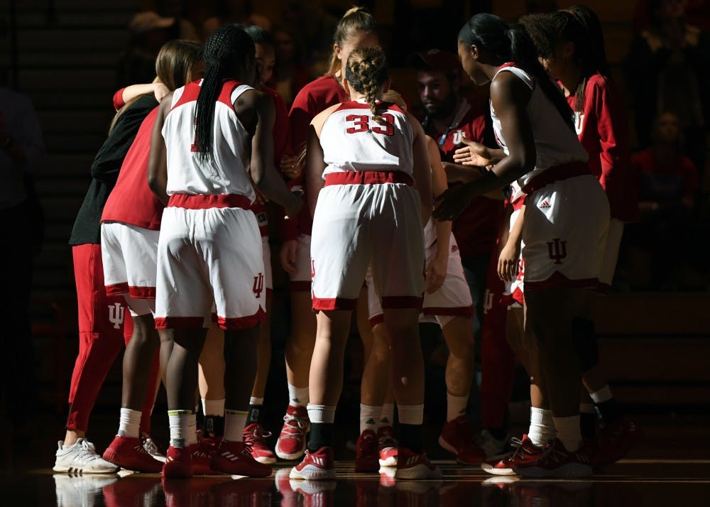 <p>The IU women's basketball team huddles up prior to their game against Louisville on Nov. 30 in Simon Skjodt Assembly Hall. IU gets set to take on No. 14-ranked Maryland on Tuesday night.&nbsp;</p>