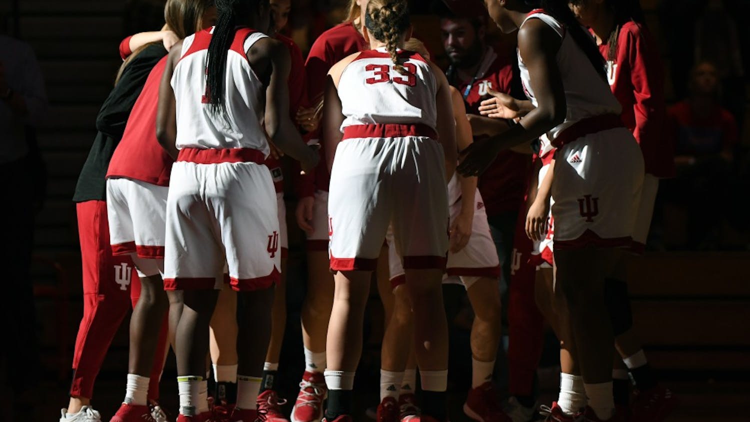The IU women's basketball team huddles up prior to their game against Louisville on Nov. 30 in Simon Skjodt Assembly Hall. IU gets set to take on No. 14-ranked Maryland on Tuesday night.&nbsp;