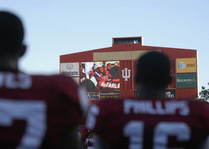 IU football players watch a video commemorating Coach Terry Hoeppner before playing Indiana State at Memorial Stadium to begin the 2007 season. IU won 55-7 in its first game since Hoeppner's death. &nbsp;