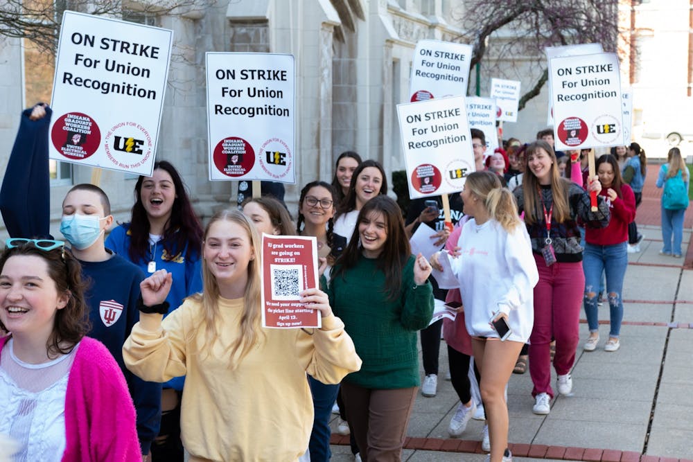 <p>Undergraduate students from Jen Maher&#x27;s gender studies class are seen participating in a march outside of the Chemistry Building on April 14, 2022. </p>