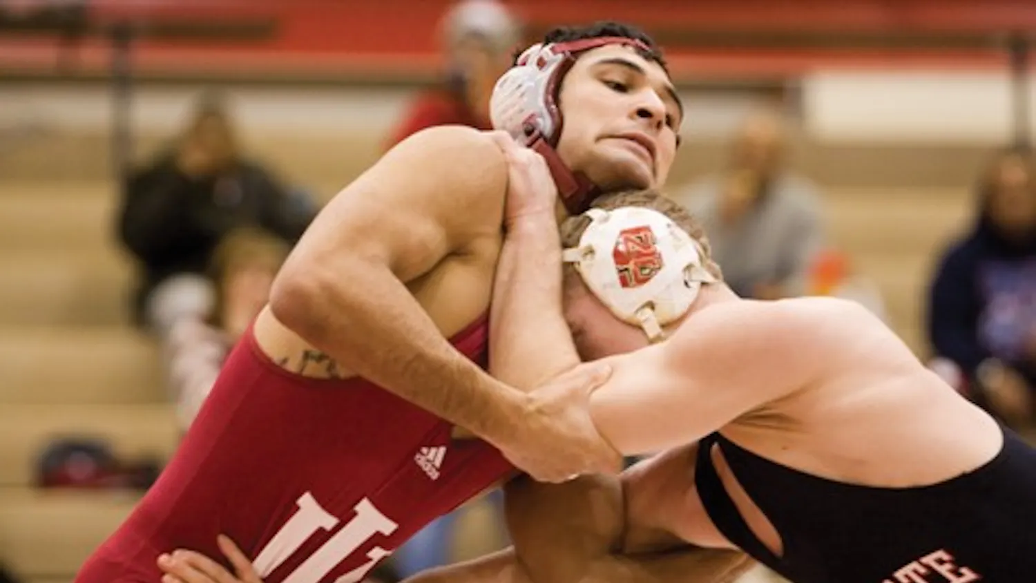 IDS FILE PHOTO
IU sophomore Andrae Hernandez grapples with a wrestler from NC State Saturday, Feb. 2, 2007.