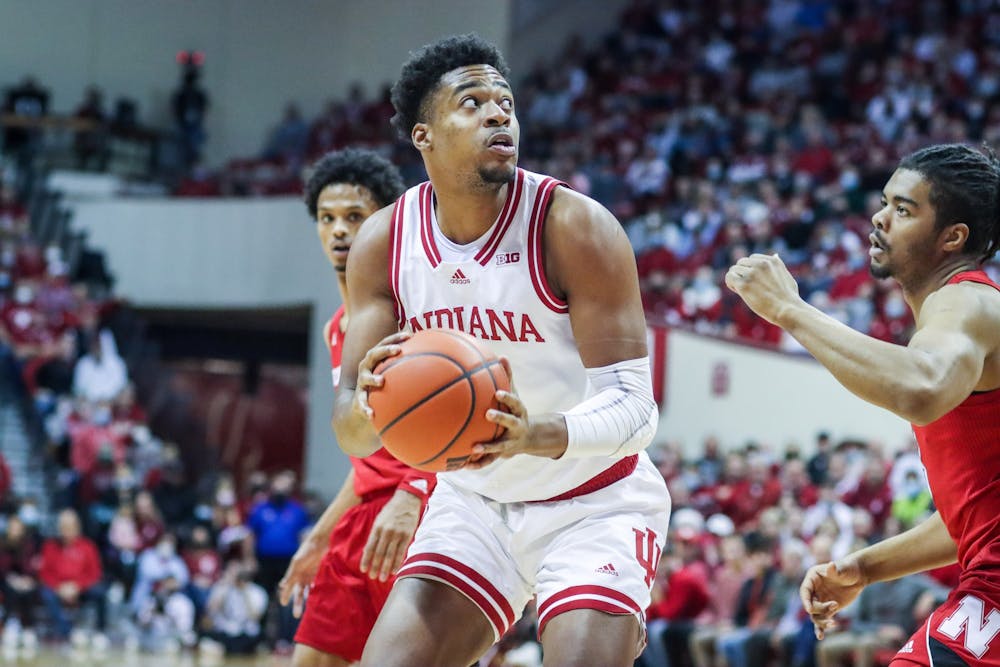 <p>Senior center Michael Durr plays offense Dec. 4, 2021, at Simon Skjodt Assembly Hall. Durr entered the transfer portal Thursday after playing one season with the Hoosiers.</p>