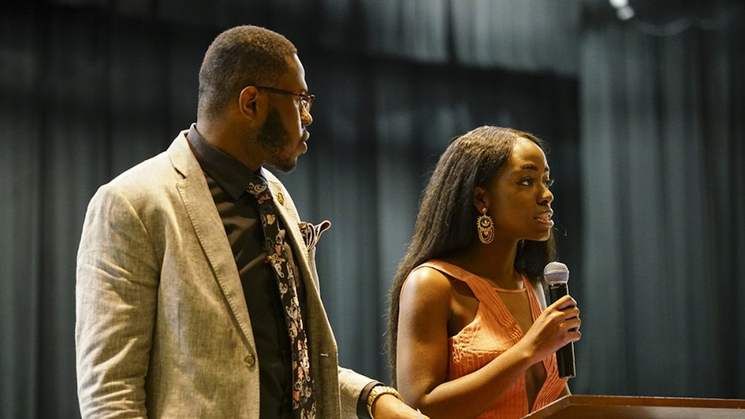 African Students’ Association President Dara Adeosun and Alpha Phi Alpha Vice President Morris Dolley open the Banquet Dinner Saturday evening in the Willkie Auditorium. The annual event was hosted by ASA in collaboration with Alpha Phi Alpha fraternity and Alpha Kappa Alpha sorority to raise money for Freetown, Sierra Leone, with World Hope International after the city suffered heavy flooding and mudslides in August.