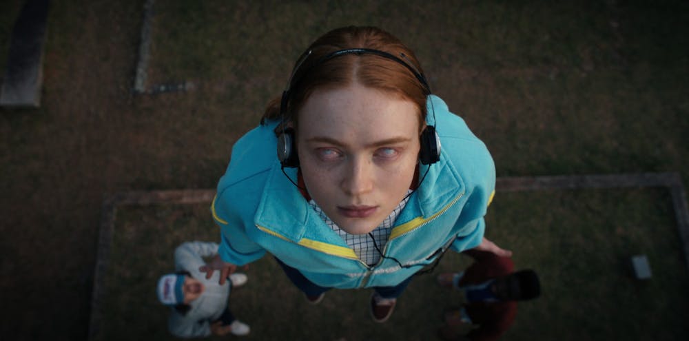<p>A movie still from episode 4 of &quot;Stranger Things&quot; is pictured, featuring Sadie Sink as Max Mayfield. On Jan. 31, 2023, Netflix inadvertently announced plans to reduce password sharing among users.</p>