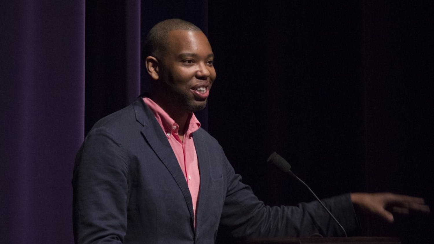 Ta-Nehisi Coates opens his lecture with a joke about the stage's open pit on Friday at the Musical Arts Center. Coates is a writer and journalist who spoke on being black in America, especially following the Ferguson shooting.