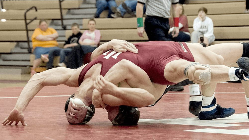 Then-junior Ryan LeBlanc wrestles his opponent during Indiana's dual against Northwestern on Feb. 23, 2013, at the University Gym.