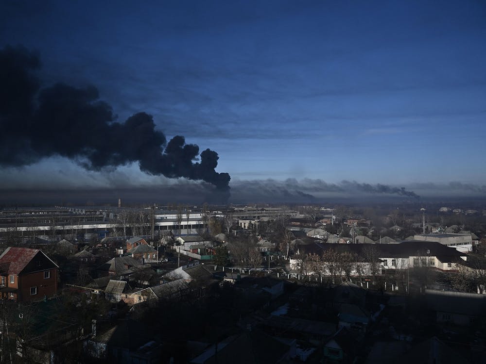 Black smoke rises on Feb. 24, 2022, from a military airport in Chuguyev, Ukraine, near Kharkiv. More than 600 viewers attended a Thursday afternoon Zoom panel discussion regarding Russia&#x27;s attack on Ukraine.