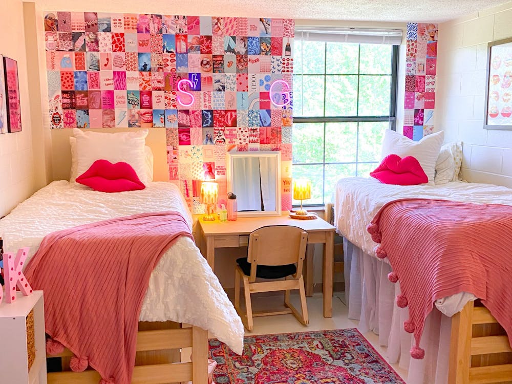 Gracie and Sammie Farrall’s room is pictured. The sisters decorated the room by using each of their talents with painting and photography. 