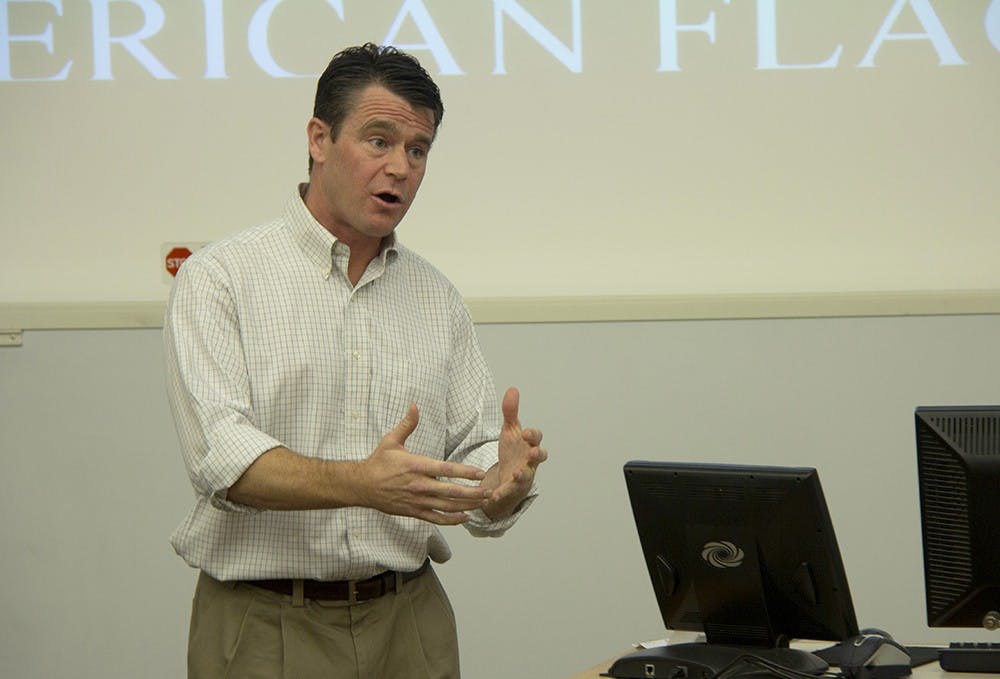 District 9 incumbent Todd Young (R-Ind.) speaks to the College Republicans group Monday at the Kelley School of Business. 