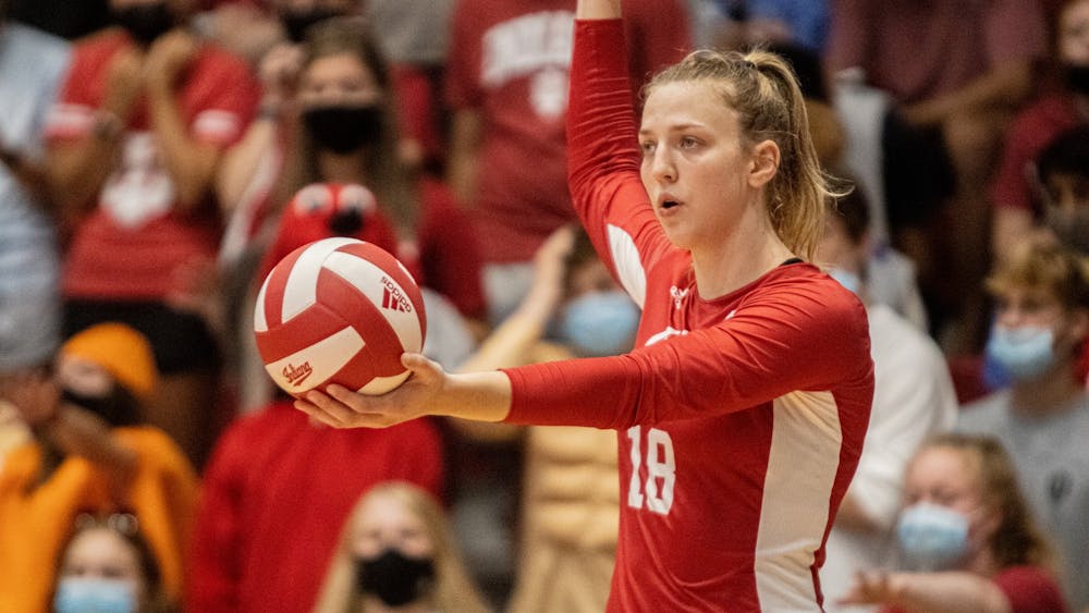 Junior Kaley Rammelsberg prepares to serve during the Indiana volleyball’s Cream and Crimson Scrimmage on Aug. 21, 2021, at Wilkinson Hall. Indiana faces Iowa in Iowa City on Friday and Northwestern in Evanston on Sunday.
