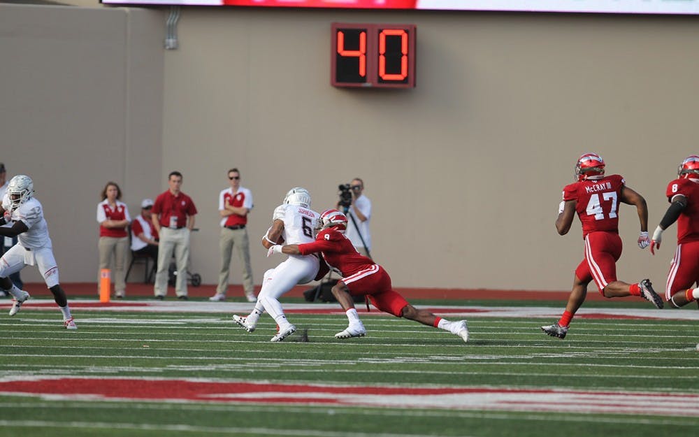 Johnathan Crawford tackles Ty Johnson. IU defeated Maryland 42-36. 