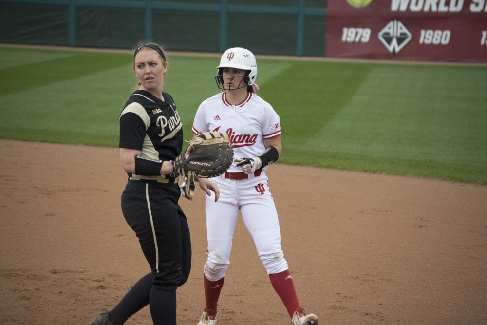 Gabbi Jenkins runs back to first after taking a bold lead off first base.  The lefty had the first hit of the game in the double header against Purdue.