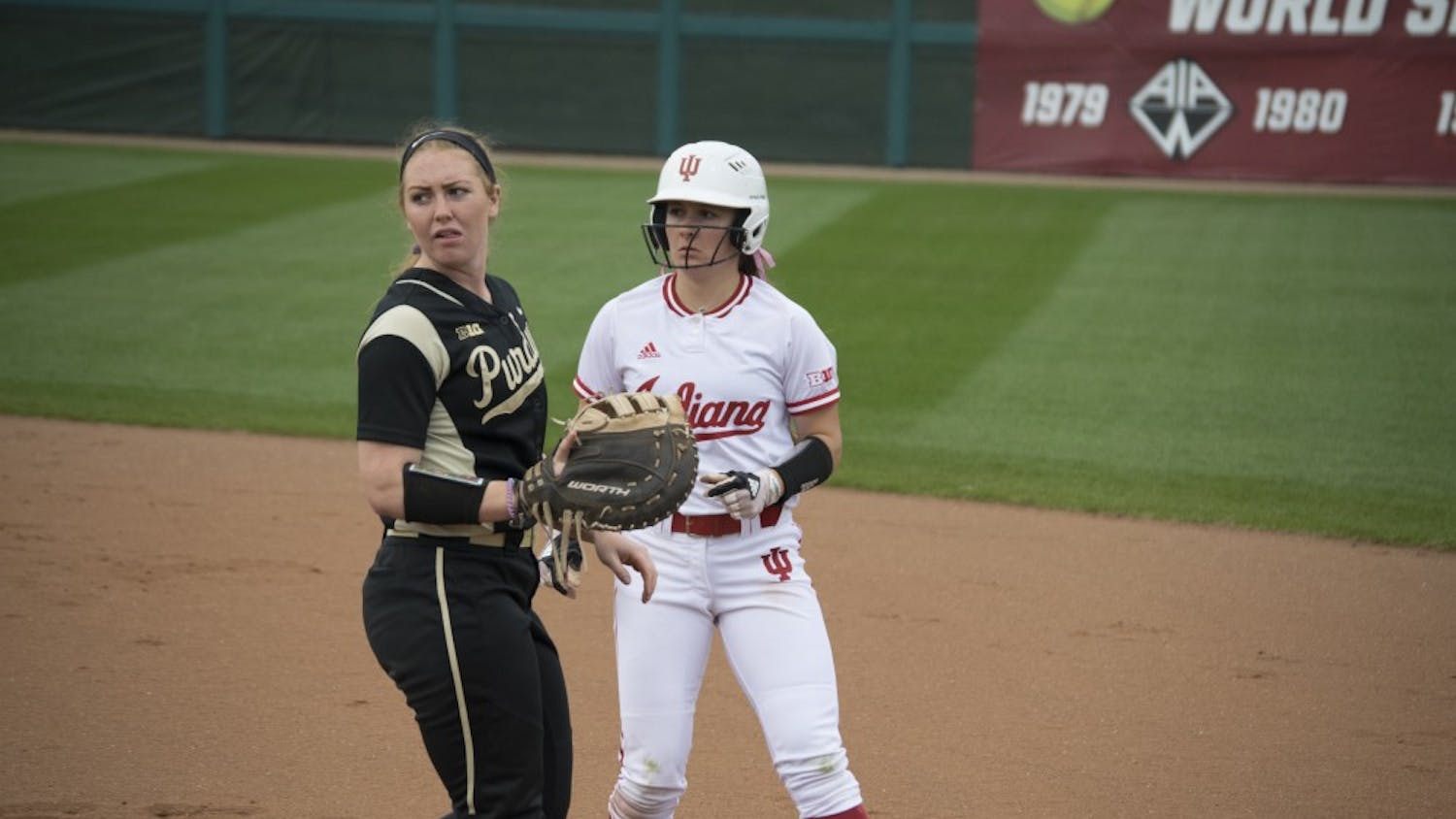 Gabbi Jenkins runs back to first after taking a bold lead off first base.  The lefty had the first hit of the game in the double header against Purdue.