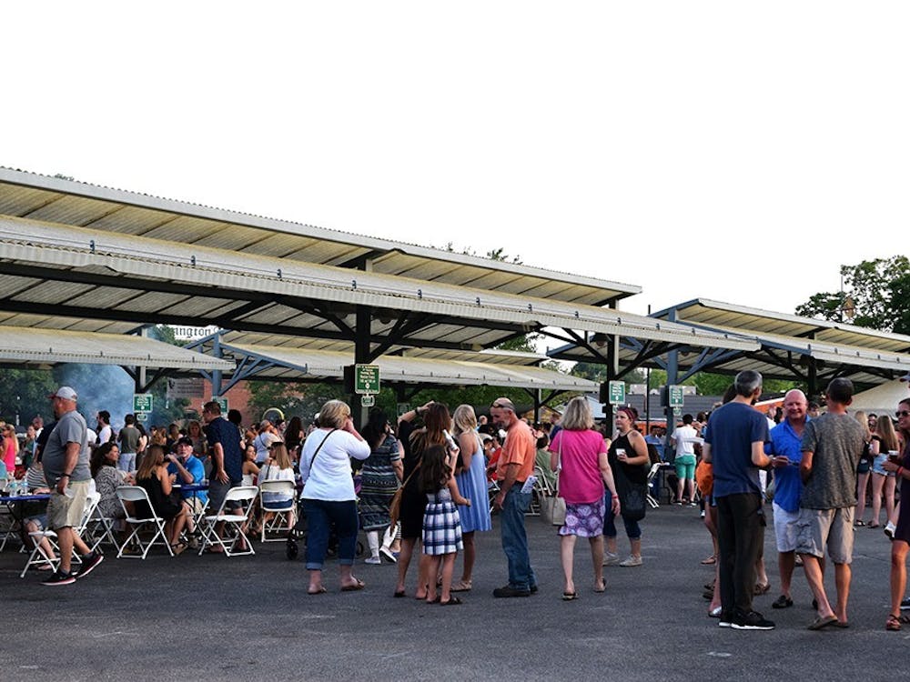 Attendees eat and gather in the commons area at Taste of Bloomington. Downtown Bloomington Inc. announced on Feb. 23, 2023, that the Taste of Bloomington festival which was supposed to be held on June 17, 2023, will not be happening.