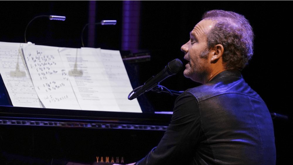 John Ondrasik of Five for Fighting performs, tells life stories and interacts with the crowd during his performance Sept. 22 at the Buskirk-Chumley Theater. Ondrasik alternated between a guitar and a piano and was accompanied by a string quartet as he performed fan favorites and popular singles “100 Years,” “Superman (It’s Not Easy)” and “Chances.”
