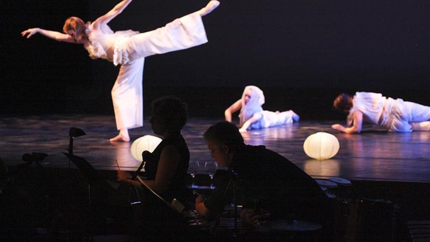 Students perform "A Strange Peace" Saturday evening at the Buskirk-Chumley Theater. Composed by graduate student Jonathan Sokol and choreographed by junior Utam Moses, the piece was one of fourteen original student works in the "Hammer and Nail" performance.