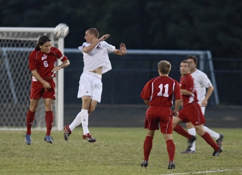 IU freshman midfielder Rich Balchan tries to block University of Illinios-Chicago senior midfielder Pavle Dundjer during the Wednesday, Oct. 3, game at Bill Armstrong Stadium. UIC lost to the Hoosiers 1-0.