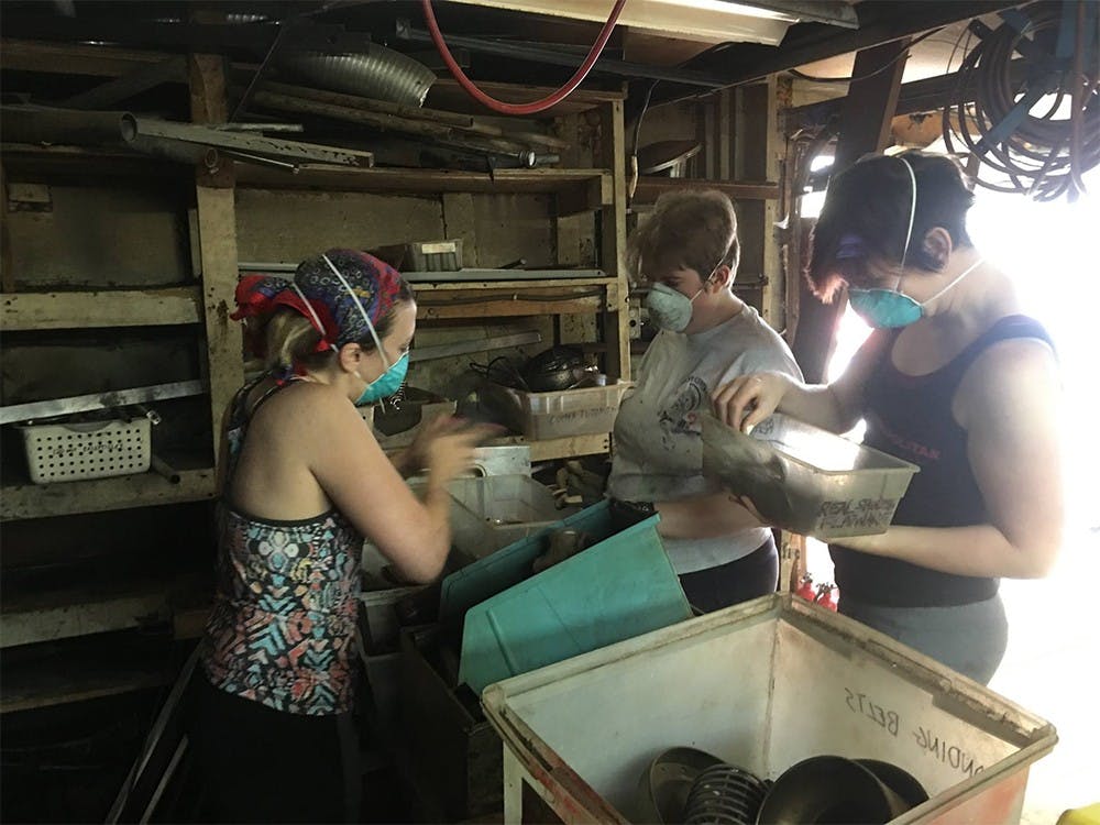 Workers at the Center for Sustainable Living attempt to revive the late Glenn Carter’s tool supply.