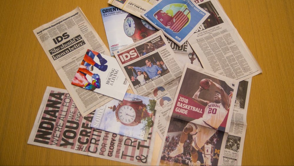 A collection of publications of the Indiana Daily Student lay on a table. The IDS won 26 Columbia Scholastic Press Association Awards at the annual ceremony.