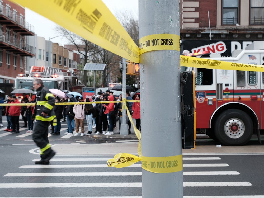 Police and emergency responders on the site of the shooting at a Brooklyn subway station on April 12, 2022, are pictured.  