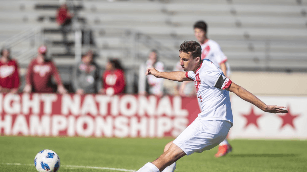 Sophomore Jack Maher plays the ball upfield during IU’s win over Michigan on Oct. 13 at Bill Armstrong Stadium. For the second week in a row Maher was named to Top Drawer Soccer's team of the week.