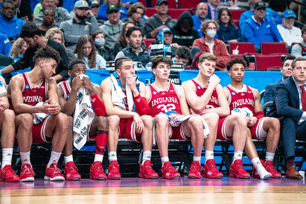 <p>The Indiana bench watch the game slip away Mar. 17, 2022, at the Moda Center in Portland, Oregon. Indiana lost 53-82 against Saint Mary’s College.</p>