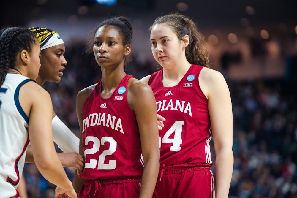 <p>Then-junior forward Mackenzie Holmes and then-sophmore guard Chloe Moore-McNeil set up for an inbound March 26, 2022, at Total Mortgage Arena in Bridgeport, Connecticut. Indiana won 79-67 against the University of Tennessee on Nov. 14.</p>