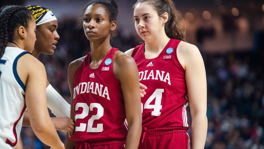 Then-junior forward Mackenzie Holmes and then-sophmore guard Chloe Moore-McNeil set up for an inbound March 26, 2022, at Total Mortgage Arena in Bridgeport, Connecticut. Indiana won 79-67 against the University of Tennessee on Nov. 14.