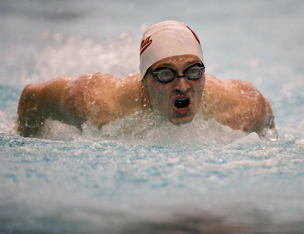 Junior Max Irwin comes into the wall during the first length of the 200M Butterfly. The Hoosiers competed in a duel meet against the Wisconsin Badgers on November 13th, 2015, with the men winning 184-116 and the women winning 182-114. 
