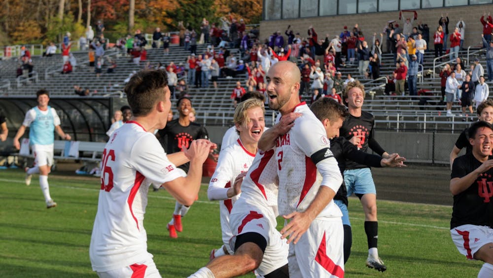 IU men&#x27;s soccer team members celebrate the game-winning goal in a match against Northwestern on Nov. 10, 2021, at Bill Armstrong Stadium. The Hoosiers will face No. 1 Clemson University in their 50th season opener.