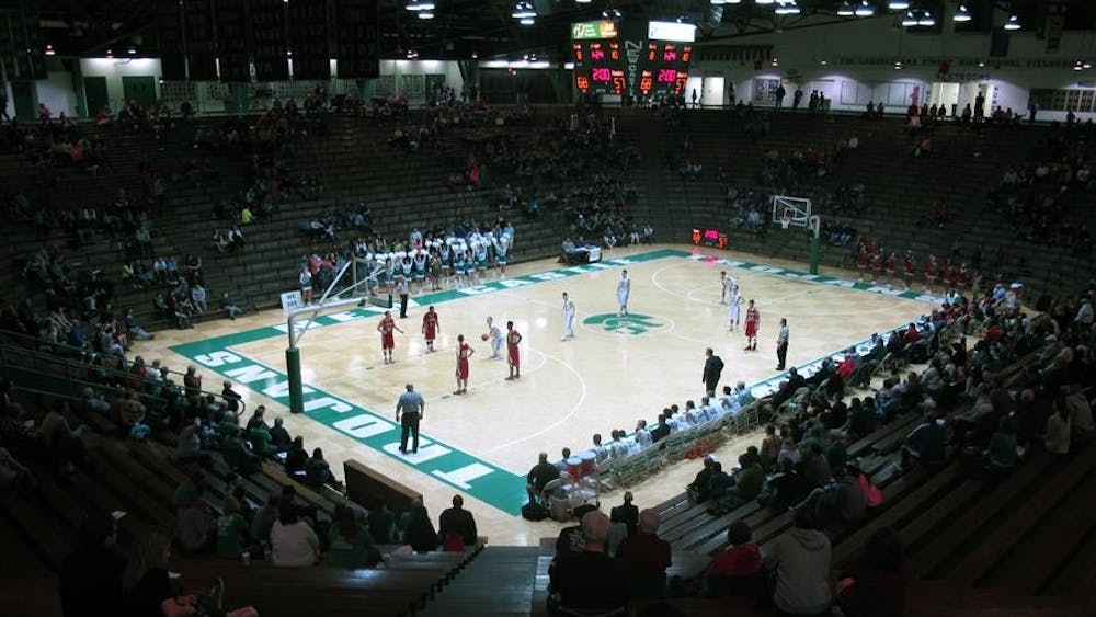 The New Castle High School Trojans play the Anderson High School Indians at the New Castle Fieldhouse, the world's largest high school gym. The gym has a seating capacity of over 9000, but only 1337 fans showed up for the game against Anderson last Friday.