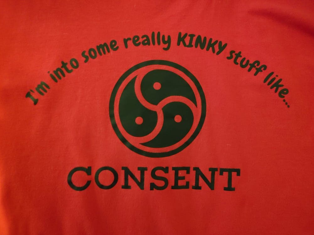 The front design for a T-shirt for IU&#x27;s SexFest reads &quot;I&#x27;m into some really kinky stuff like... consent.&quot; The final event of the festival was canceled after a video was posted online showing a demonstration by Bloomington Kink.