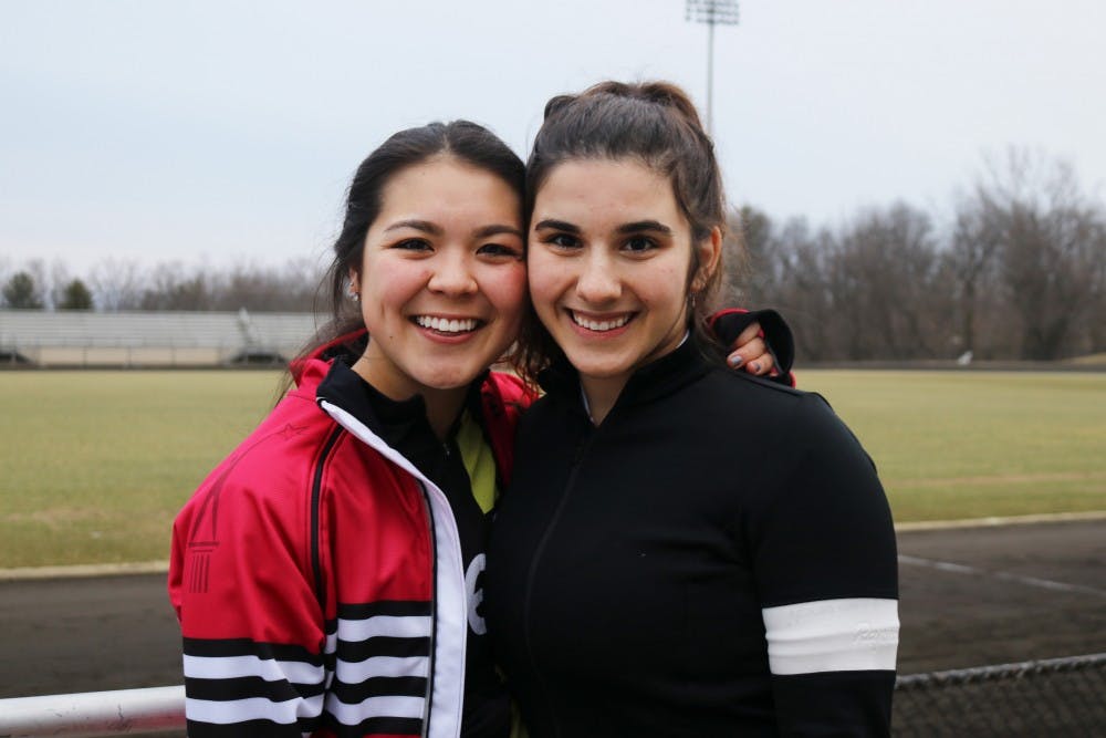 <p>Kappa Alpha Theta Bike Team Rookie Anna Young is supported by veteran rider Erika Arakawa during Rookie Week for the 2019 Little 500 race. Rookie week requires first-time riders to practice 15.5 hours on the track.</p>