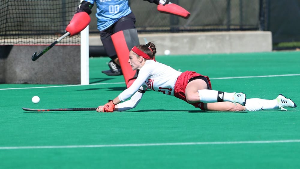 <p>Junior Peyton Becker dives on the field during a match against Michigan State on April 15 in East Lansing, Michigan. The Hoosiers will play against Michigan State again at 1 p.m. Tuesday in Iowa City, Iowa. </p>