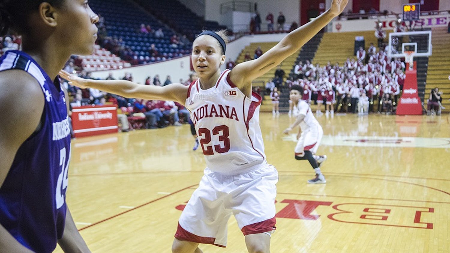Sophomore guard Alexis Gassion disrupts an inbound pass durning the last two minutes of the IU’s game against Northwestern at Assembly Hall on Thursday. The game had 11 lead changes and the Hoosiers lost 75-69.