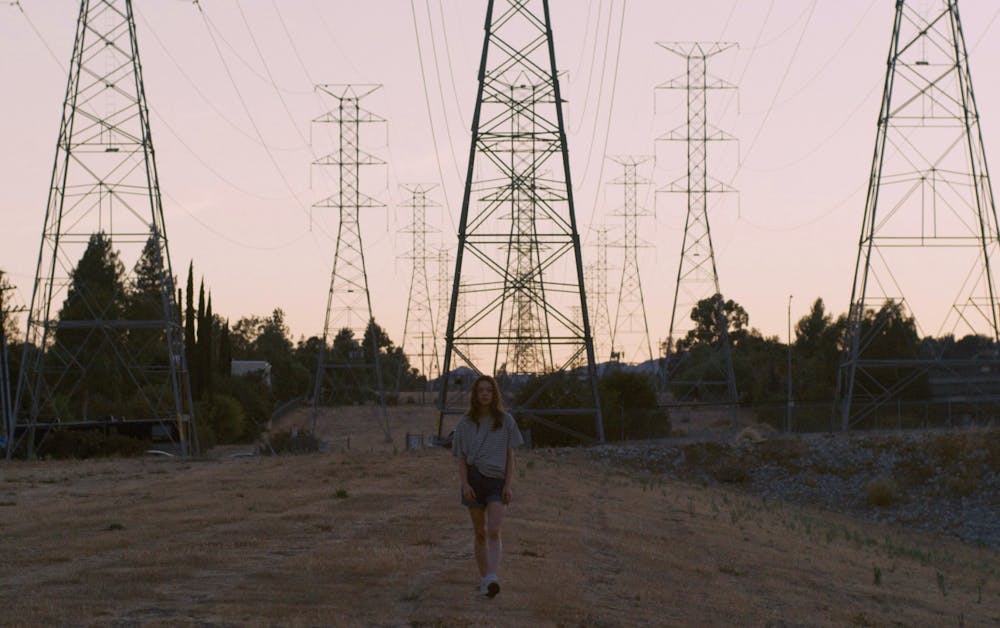 <p>A still shot from &quot;Palm Trees and Power Lines&quot; features a field of powerlines after sunset. The Citizens Action Coalition, a consumer advocacy group, has accused energy company AES Indiana of presenting deceptive information to consumers on how much their energy bills will increase in 2024.  </p>