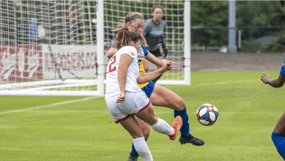 Junior Melanie Forbes plays a ball into the box during IU’s match against Morehead State University on Sept. 8 at Bill Armstrong Stadium. IU beat the University of Kentucky, 1-0, with Forbes scoring the only goal of the match.