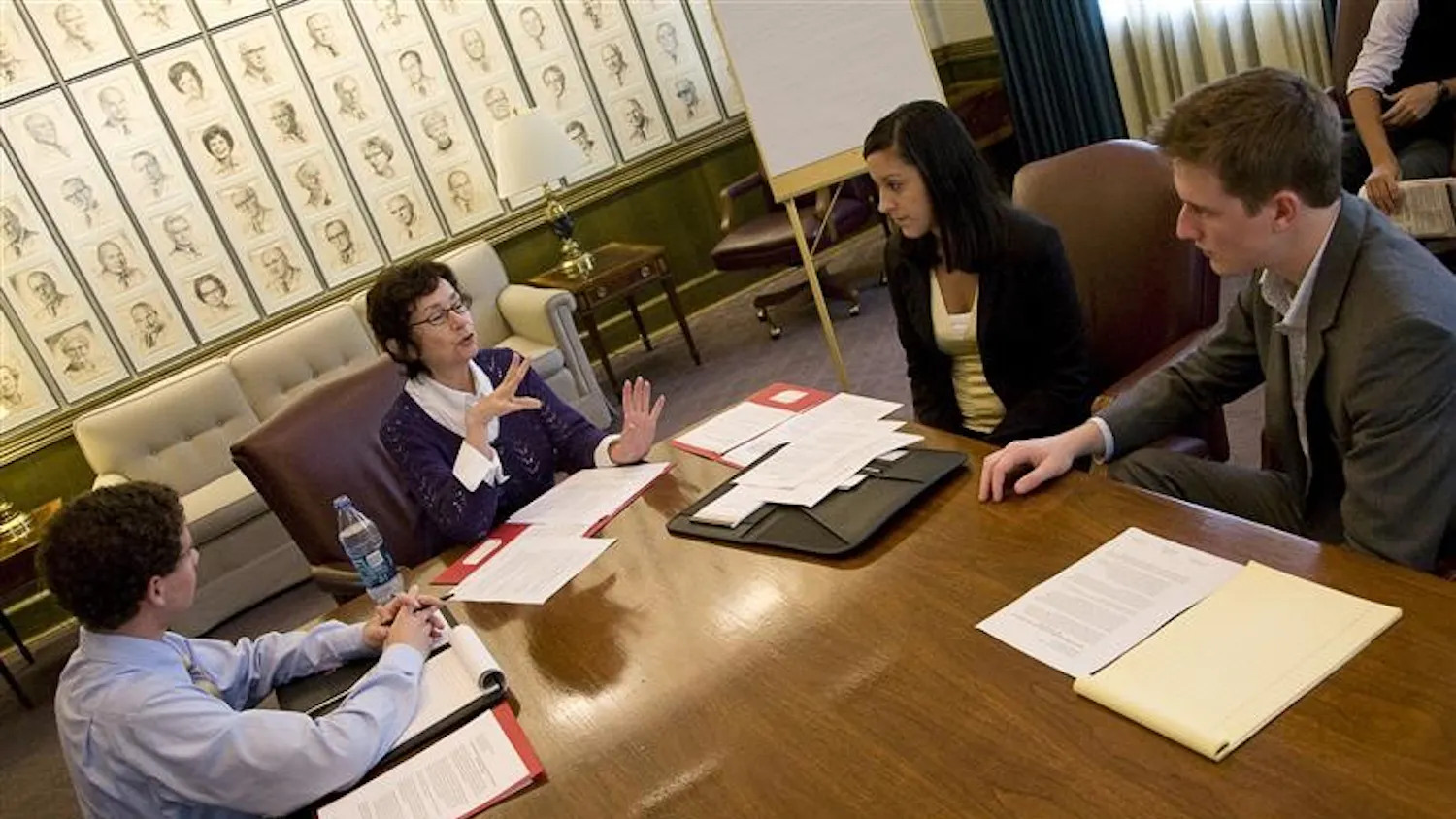 Indiana Sen. Vi Simpson consults with IU Student Association members Andrew Hahn, Jill Deluna, and Torrey Kittle about an IUSA tax proposal on Friday in the Indiana Memorial Union. The proposal seeks to institute a statewide tax free weekend on back-to-school purchases.