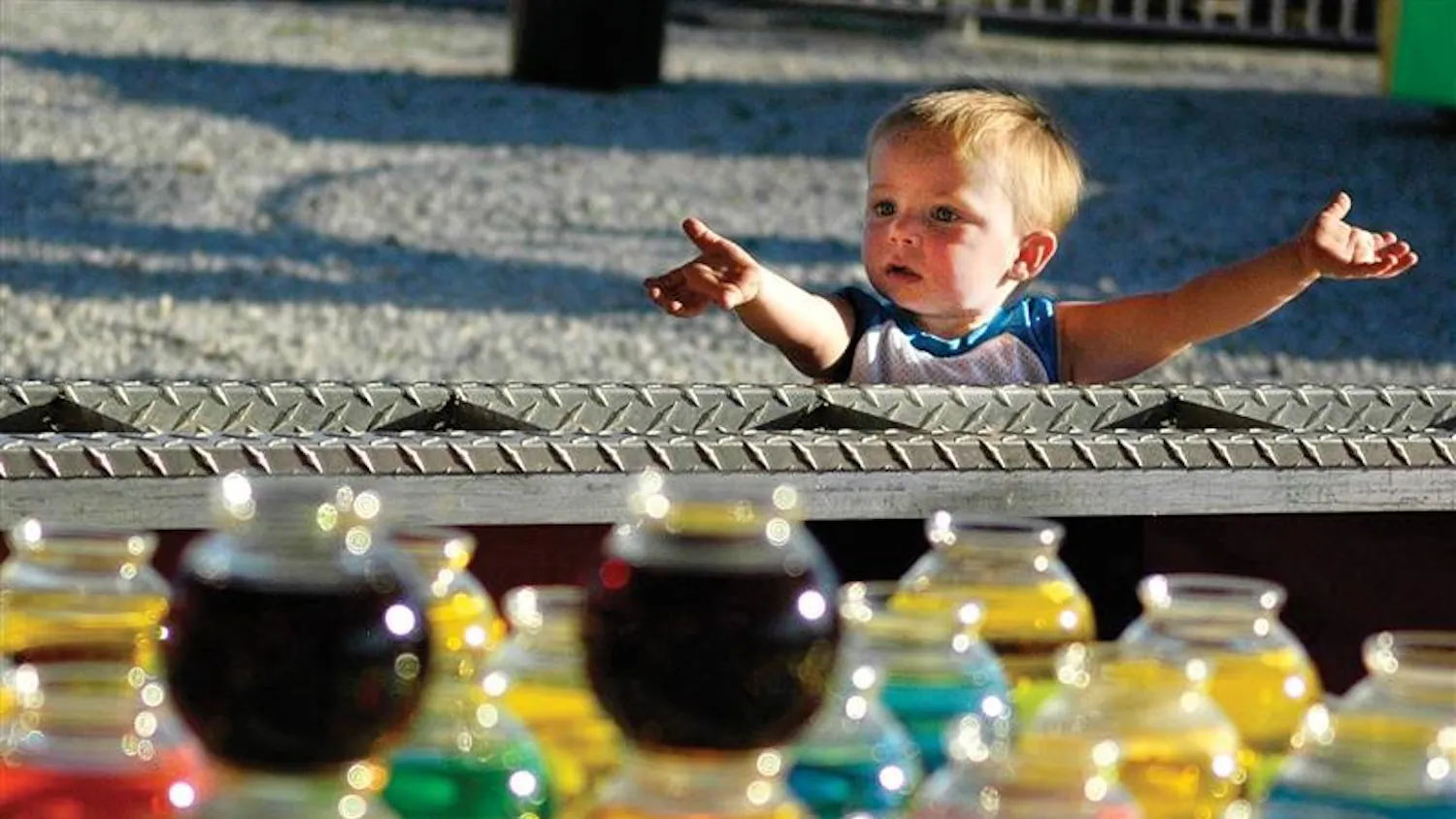 Brayden Honeycutt, 1, plays a game at the 51st annual Fun Frolic on June 14, 2008, in the west parking lot of Memorial Stadium. The event proceeds benefit both IU Campus Child Care and the Big Brothers Big Sisters of South Central Indiana.