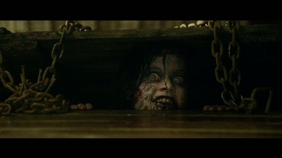 One of the evil dead emerges.