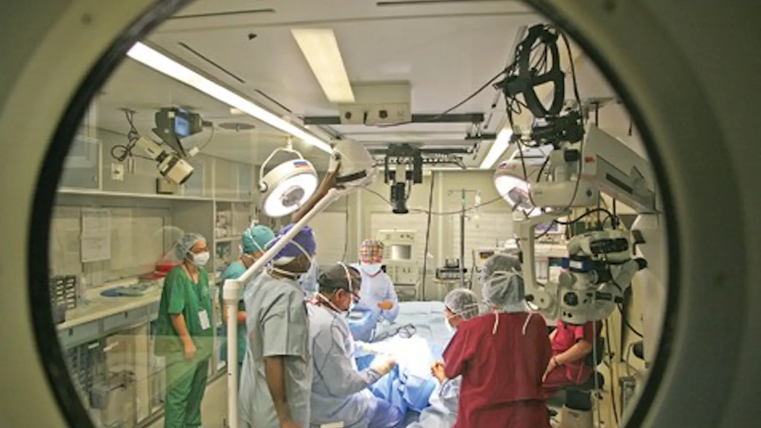 COURTESY PHOTO
IU School of Medicine professor and retina specialist Dr. Hua Gao performs surgery on a plane as part of ORBIS international, a non-profit orgainization otherwise known as the Flying Eye Hospital.