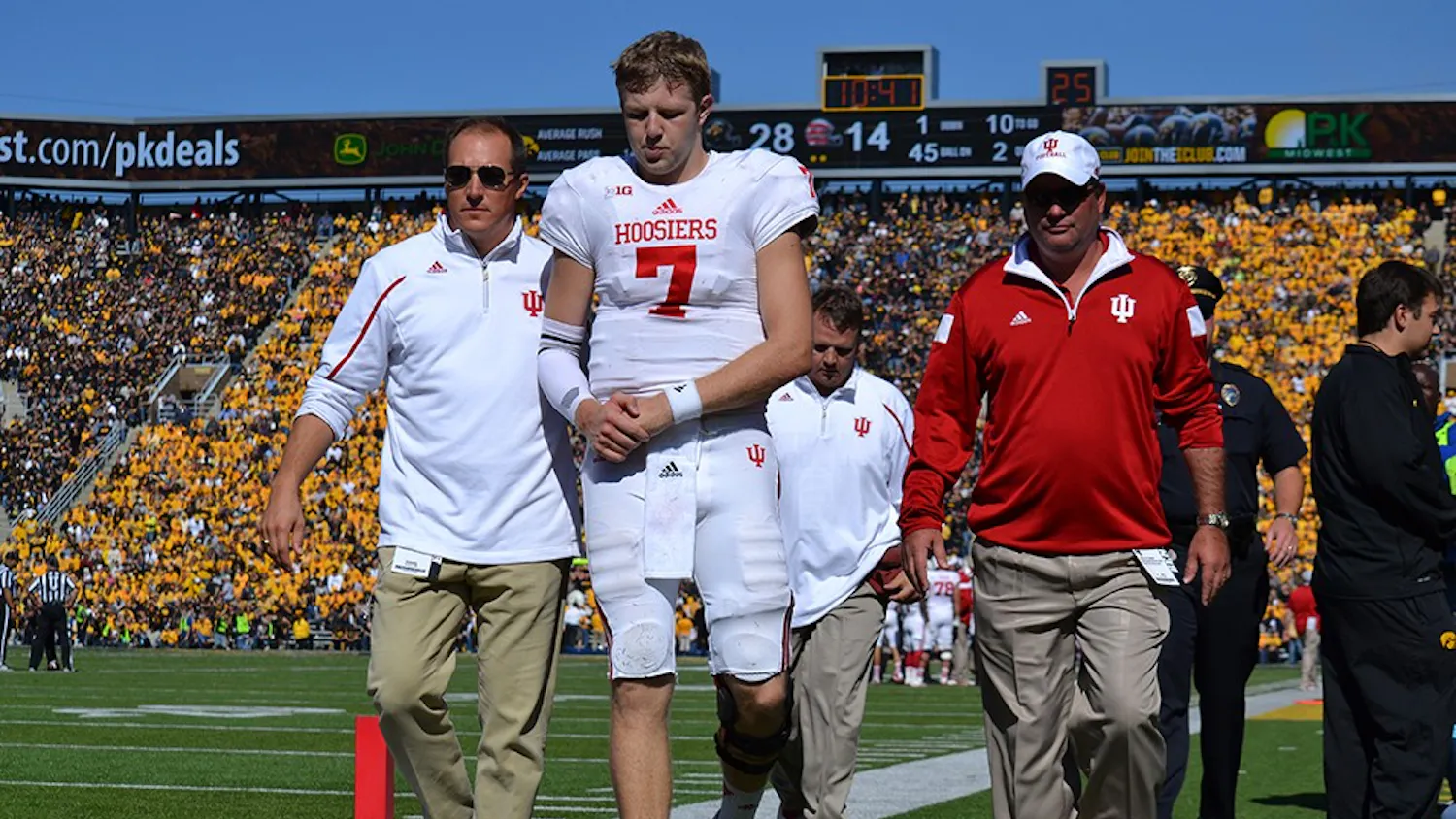 Junior quarterback Nate Sudfeld walks off the field after being injured during IU's game against Iowa on Saturday at Kinnick Stadium in Iowa City, Iowa.