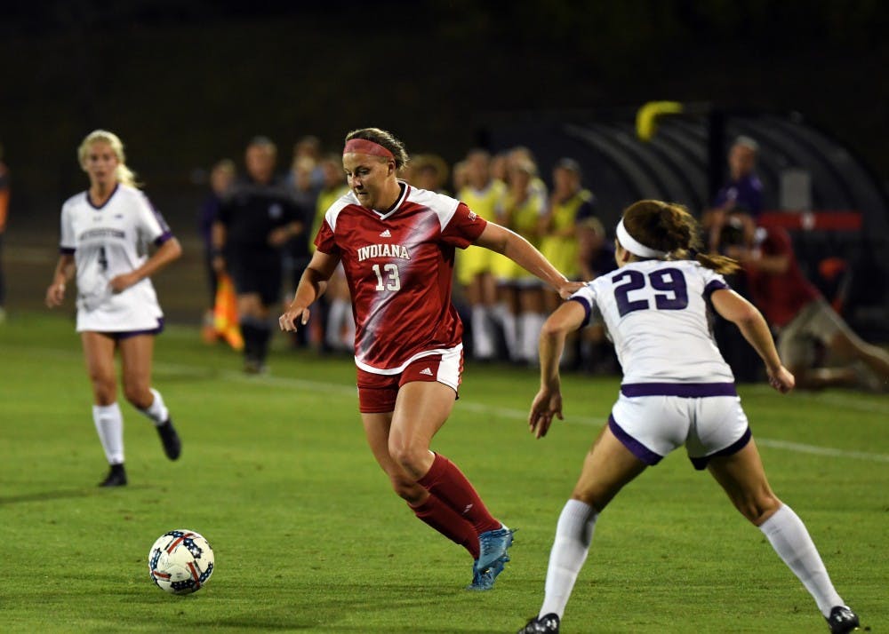 Junior forward Maya Piper dribbles the ball against Northwestern Thursday evening at Bill Armstrong Stadium. Piper scored IU's only goal in a 2-1 loss to Northwestern.