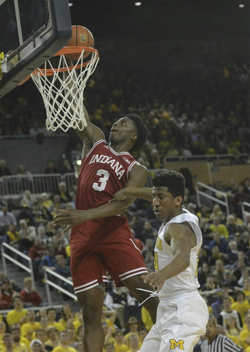 Freshman forward O.G. Anunoby dunks during the game against Michigan on Tuesday at Crisler Center in Ann Arbor, Mich.