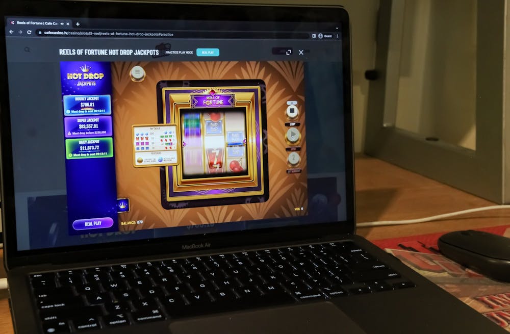 <p>An iGaming slots site is seen on a student&#x27;s laptop Oct. 9. The Indiana Gaming Commission released a 103-page study that found introducing internet gambling to the state would be a smooth process.</p>