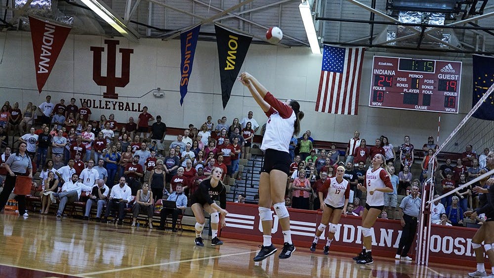 Junior right side hitter Elizabeth Asdell (14) bumps the ball over for a point against Indiana State University during the Indiana Invitational in August. The Hoosiers have two opportunities to win a Big Ten match this weekend against Rutgers and No. 1 Penn State. &nbsp;