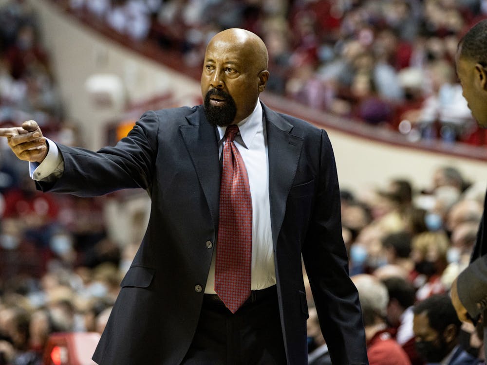 Indiana men’s basketball head coach Mike Woodson points toward the court during a game against Ohio State on Jan. 6, 2022, at Simon Skjodt Assembly Hall.