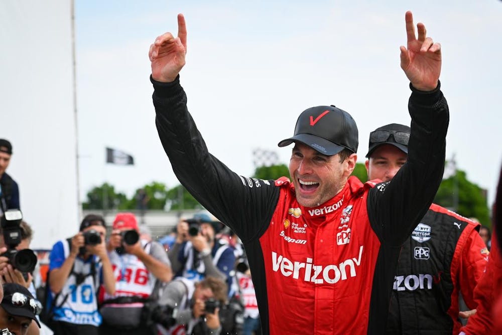 <p>IndyCar driver Will Power celebrates after winning the Detroit Grand Prix on June 5, 2022, in Detroit. Power started from the sixteenth position.</p>