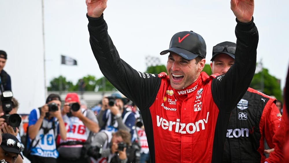 IndyCar driver Will Power celebrates after winning the Detroit Grand Prix on June 5, 2022, in Detroit. Power started from the sixteenth position.