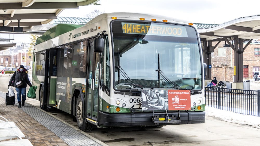 Bloomington Transit bus is pictured at the transit center. Bloomington Transit will expand their voucher program with Uber and Lyft and begin allowing people to schedule same-day rides starting July 3. 